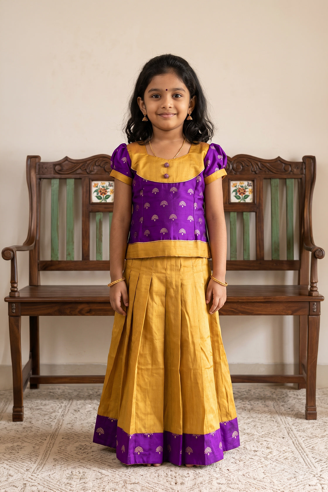 Yellow Readymade Cotton Pavadai Set with Zari Butta on the body and Fancy Border displayed on a mannequin