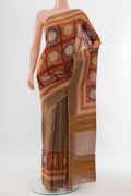 Beige Tussar Silk Saree with Floral Print on the body and Silk Border displayed on a mannequin