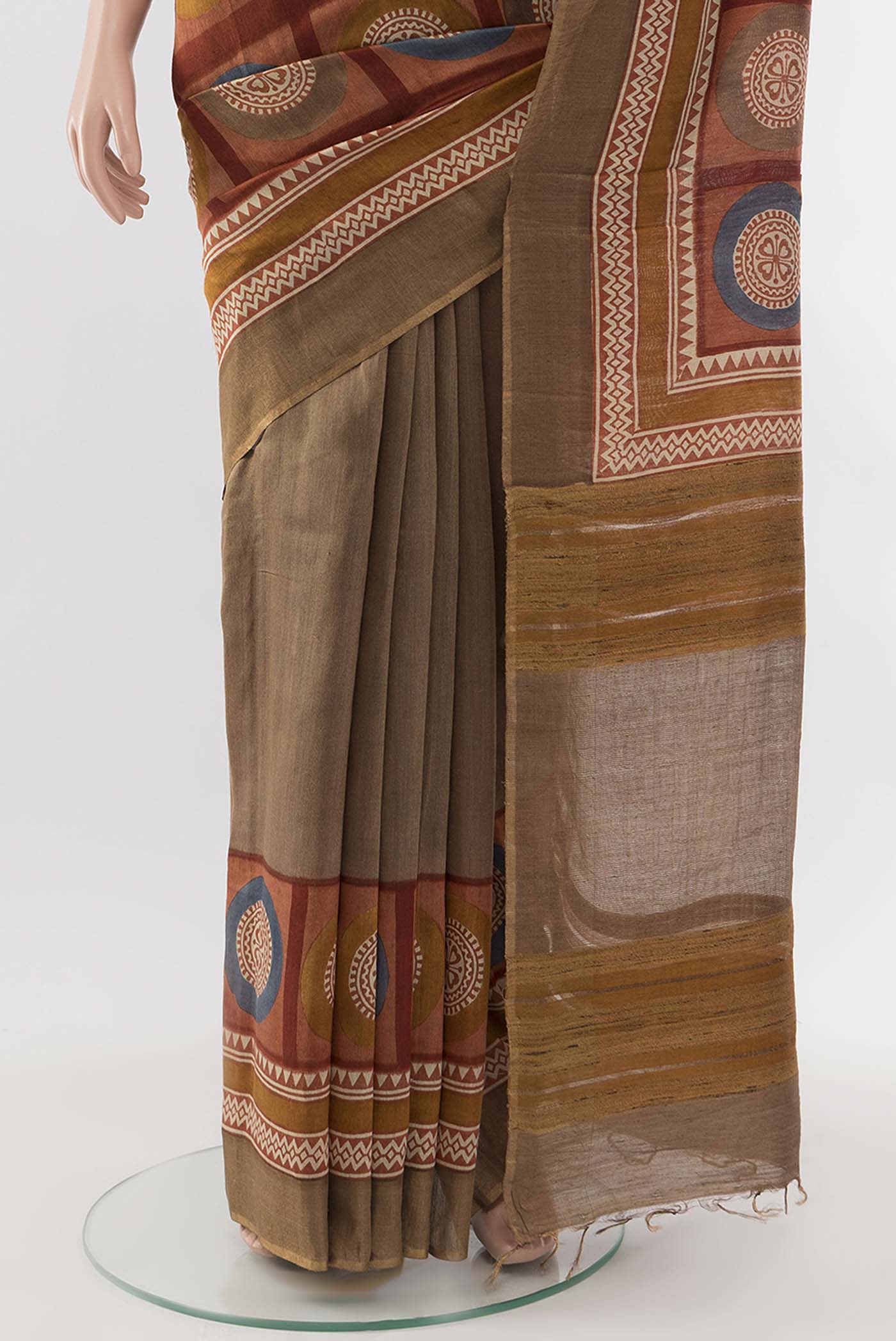 Pleats and pallu of Beige Tussar Silk Saree with Floral Print on the body and Silk Border
