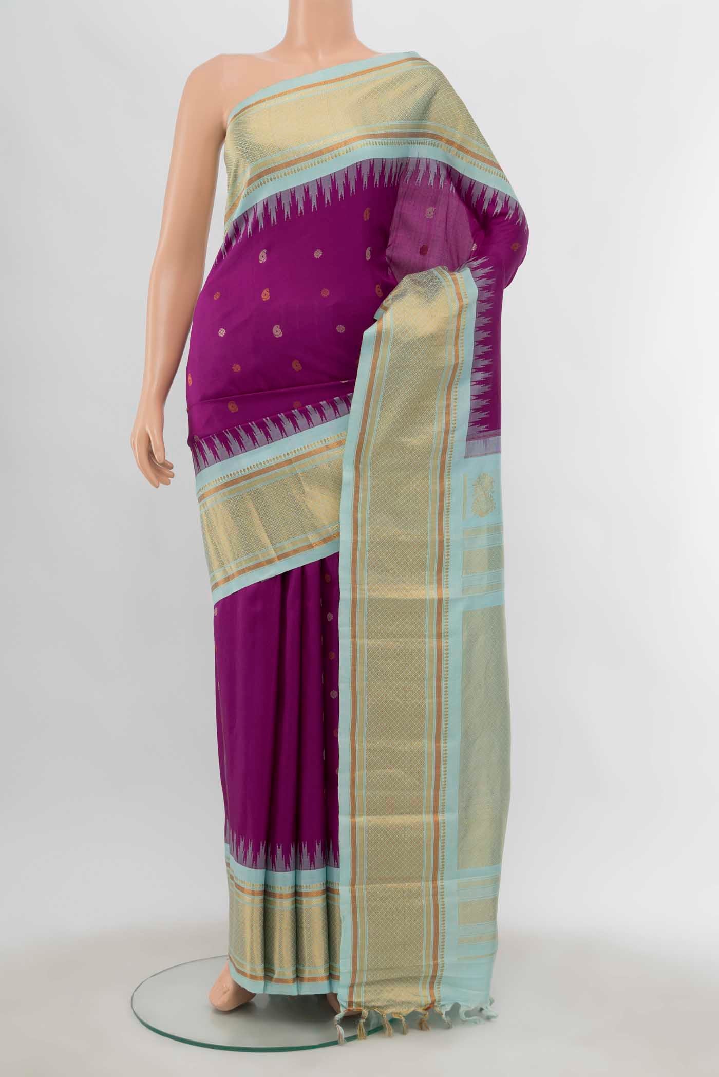 Purple Gadwal Silk Saree with Zari Butta on the body and Silk Border displayed on a mannequin