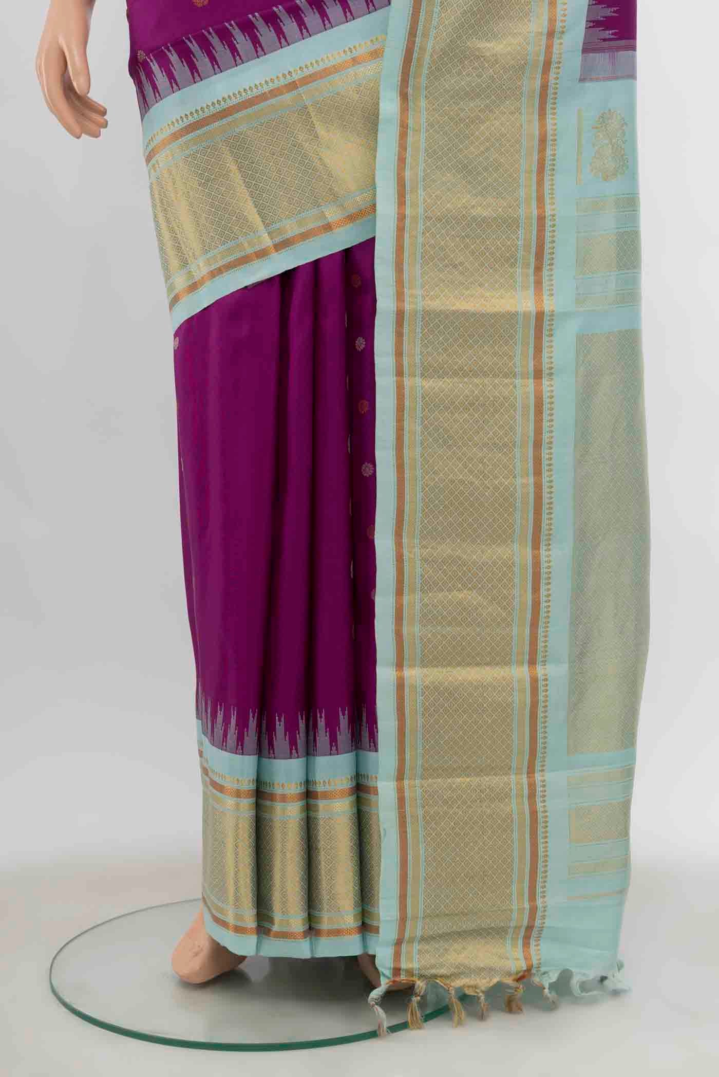 Pleats and pallu of Purple Gadwal Silk Saree with Zari Butta on the body and Silk Border