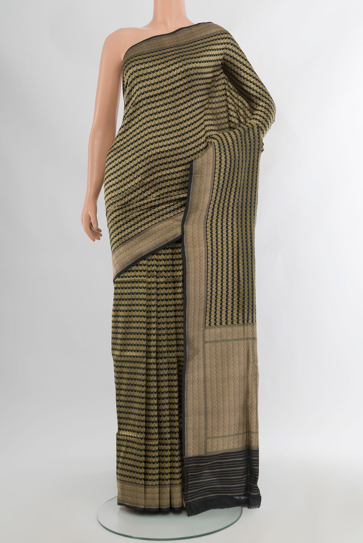 Black Banarasi Silk Saree with Zari Brocade on the body and Zari Border.  displayed on a mannequin