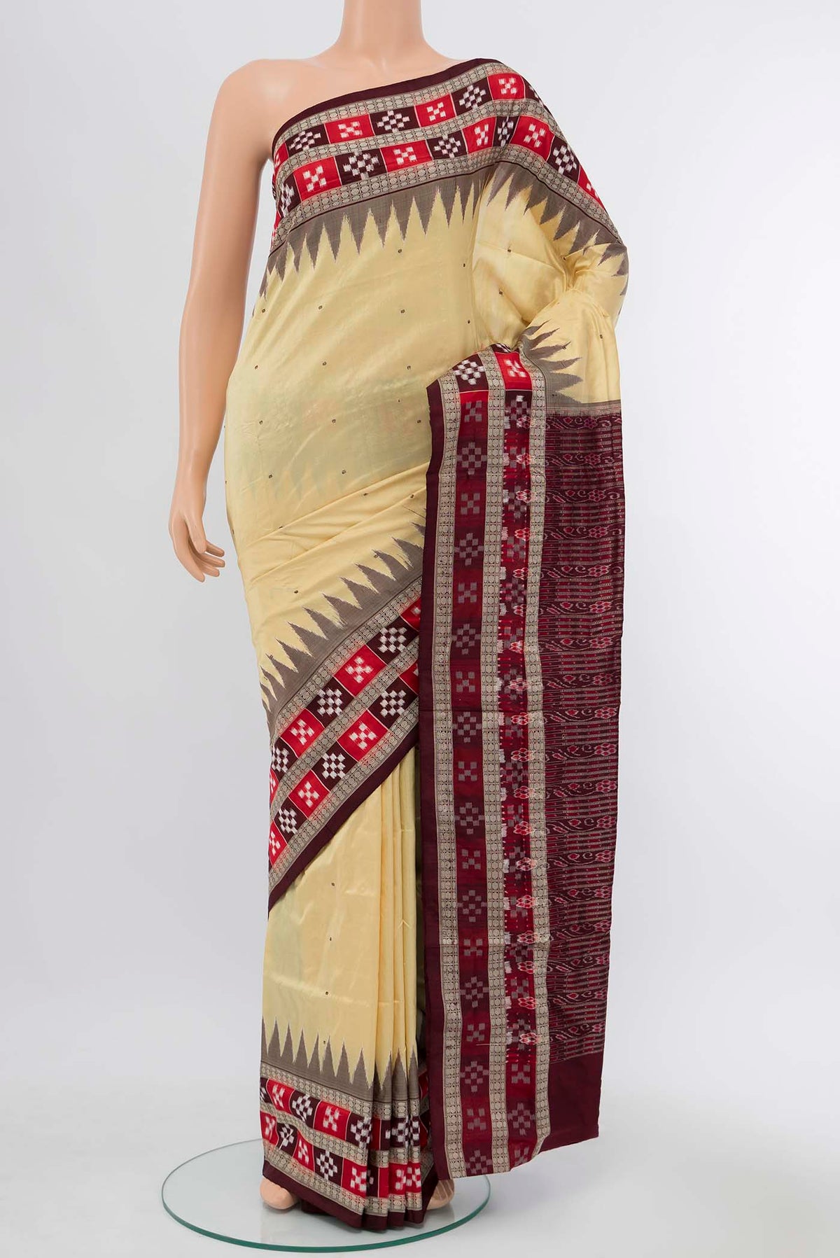 Cream Assam Silk Saree with Jacquard With Thread Butta on the body and Silk Border displayed on a mannequin