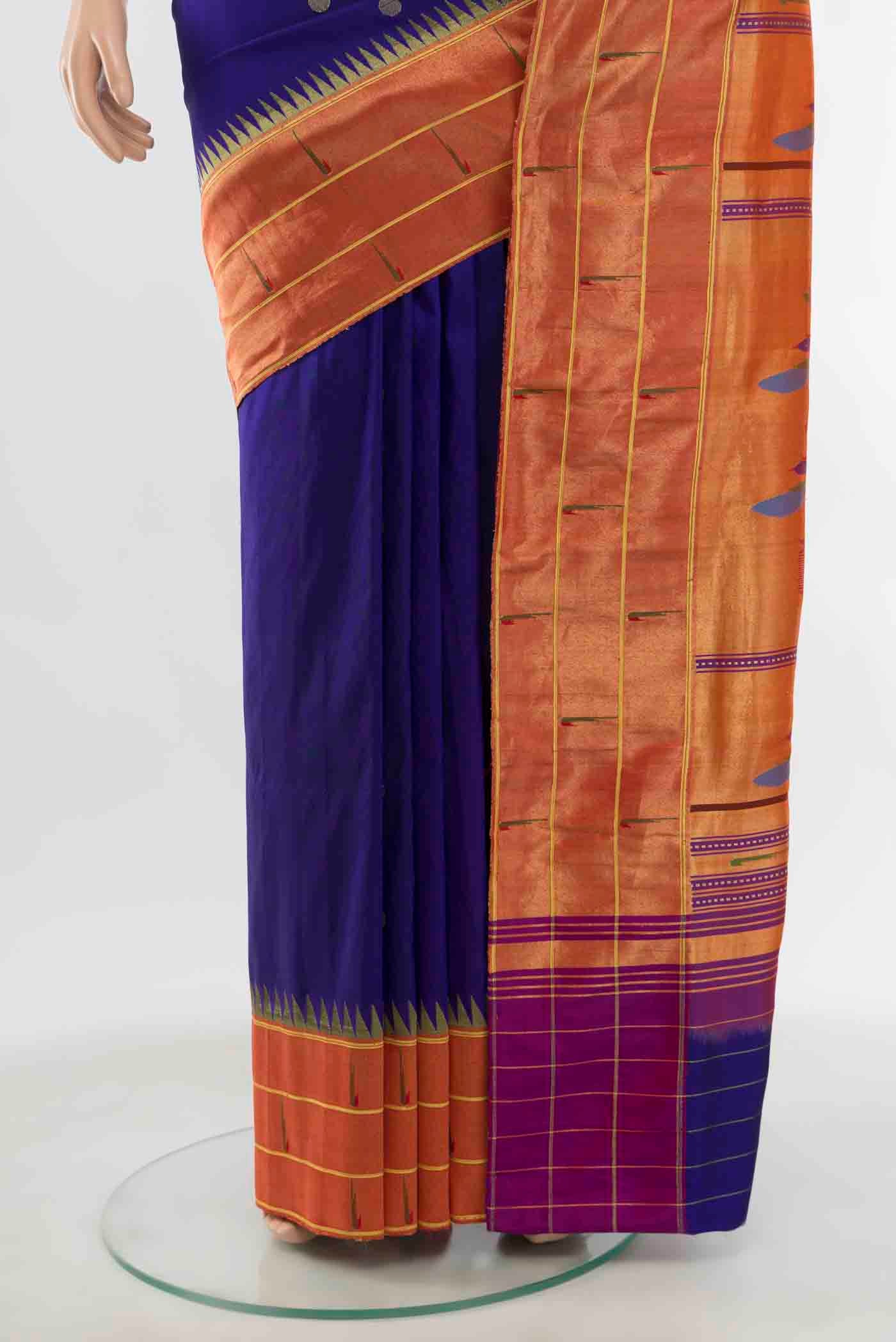 Pleats and pallu of Dark Blue Paithani Silk Saree with Zari Butta on the body and Silk Border