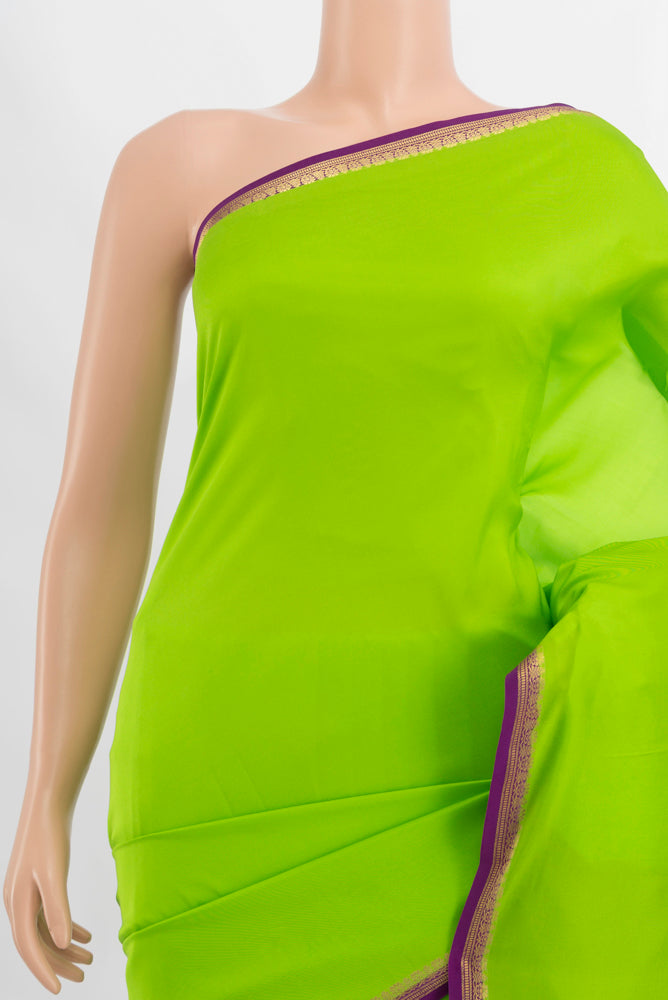 Border image of Parrot Green Mysore Crepe Saree with Plain Body and Silk Border. 