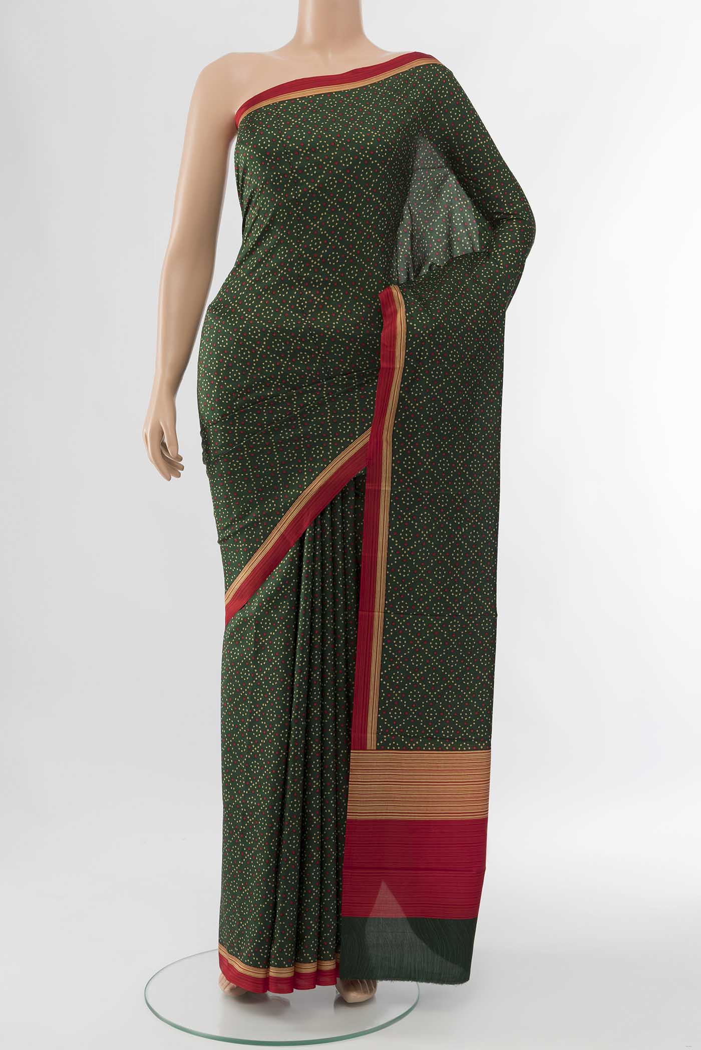 Bottle Green Printed Silk Saree with Floral Print on the body and Fancy Border displayed on a mannequin
