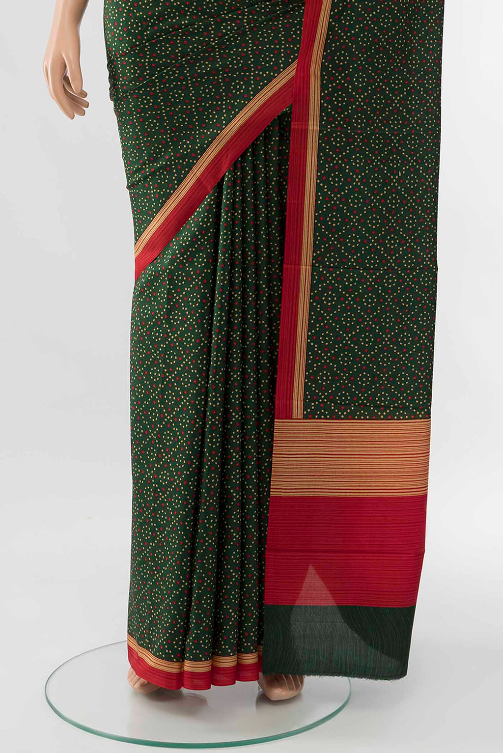 Pleats and pallu of Bottle Green Printed Silk Saree with Floral Print on the body and Fancy Border
