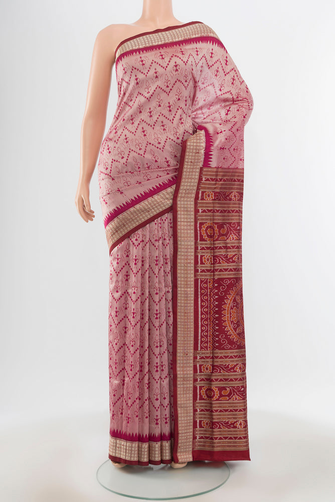 Multi Color Orissa Silk Saree with Ikat Print on the body and Silk Border.  displayed on a mannequin