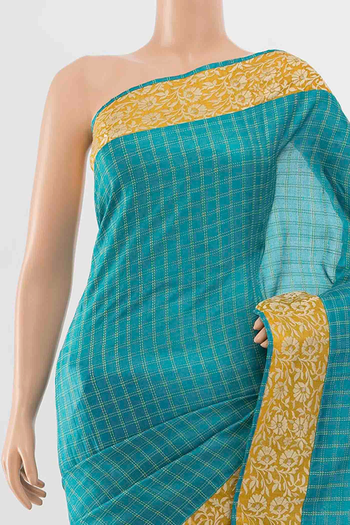 Border image of Light Blue Tussar Silk Saree with Zari Butta on the body and Silk Border
