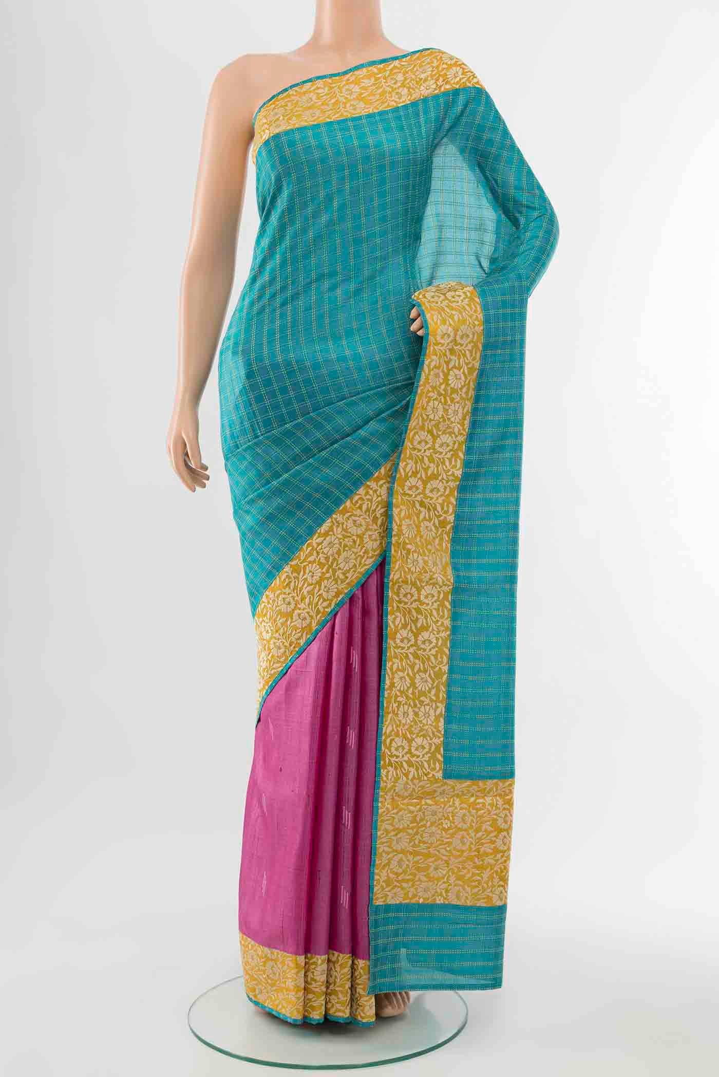 Light Blue Tussar Silk Saree with Zari Butta on the body and Silk Border displayed on a mannequin