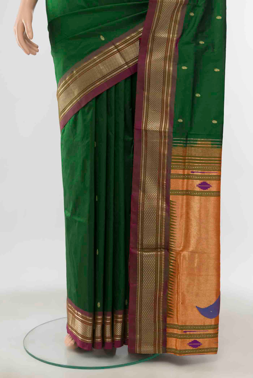 Pleats and pallu of Bottle Green Paithani Silk Saree with Zari Butta on the body and Silk Border