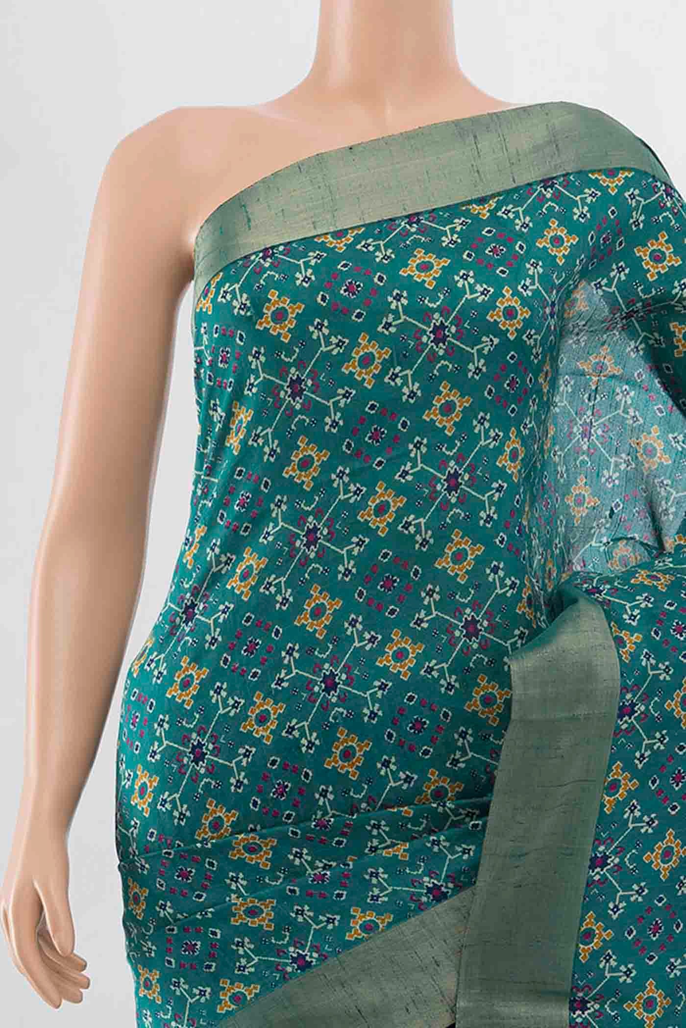 Border image of Blue Tussar Silk Saree with Ikat Print on the body and Zari Border