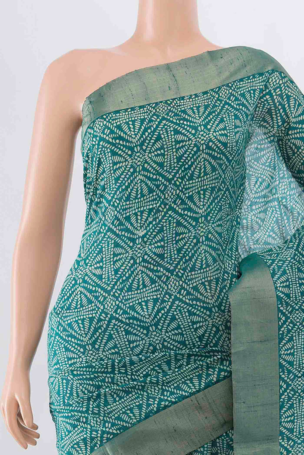 Border image of Blue Tussar Silk Saree with Printed design on the body and Zari Border