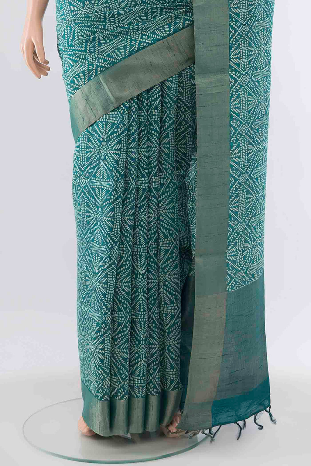 Pleats and pallu of Blue Tussar Silk Saree with Printed design on the body and Zari Border