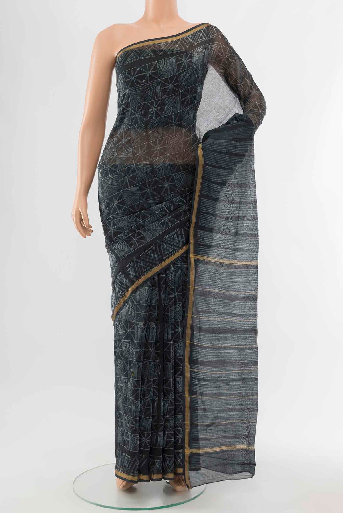 Navy Blue Chanderi Silk Cotton Saree with Printed design on the body and Thin Zari Line displayed on a mannequin