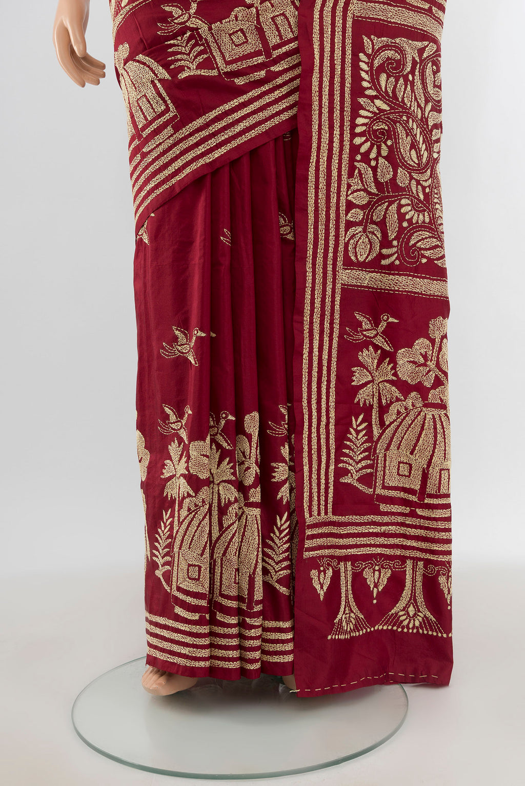 Pleats and pallu of Maroon Kantha Silk Saree with Kantha Work on the body and Embroidery Border. 