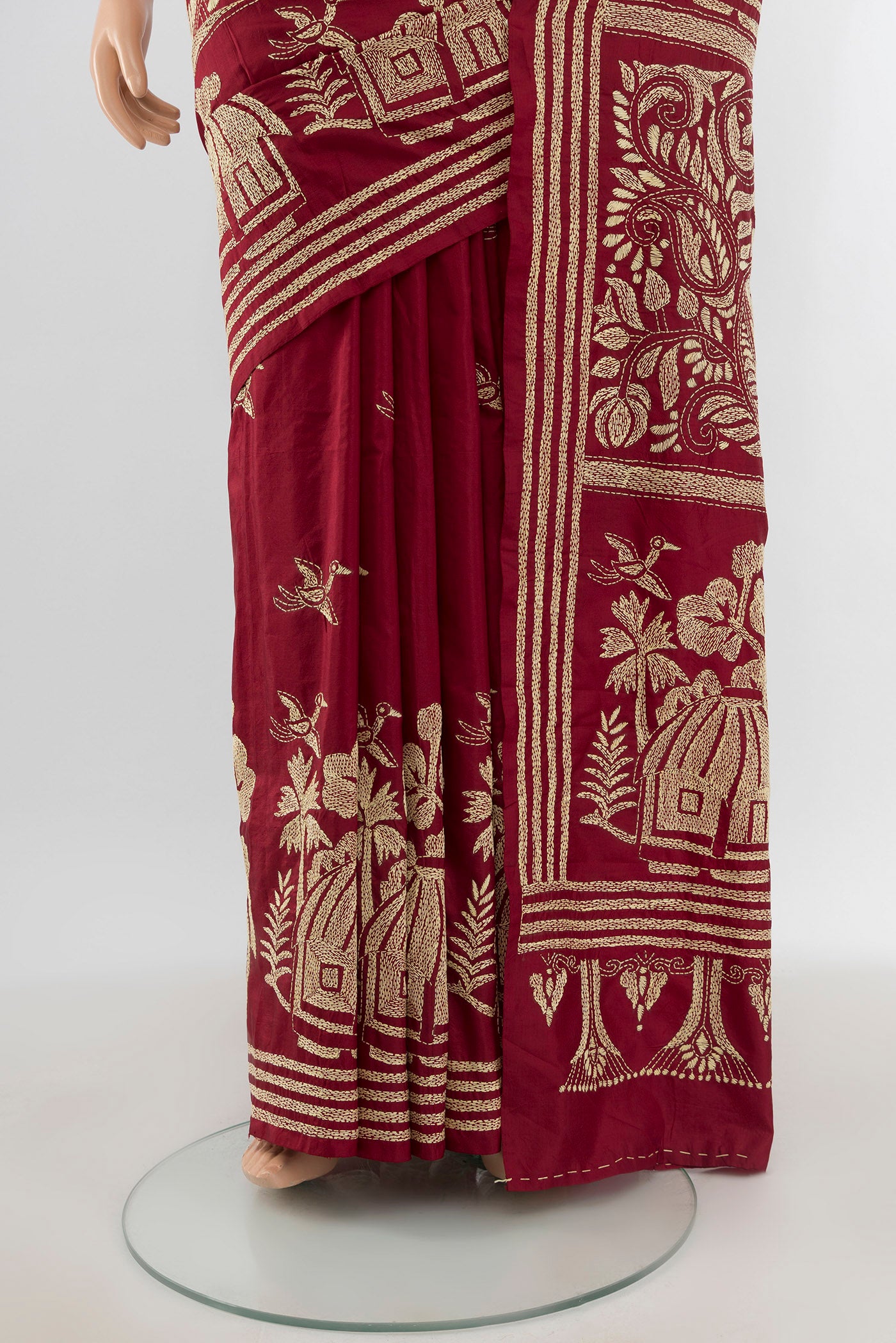Pleats and pallu of Maroon Kantha Silk Saree with Kantha Work on the body and Embroidery Border. 