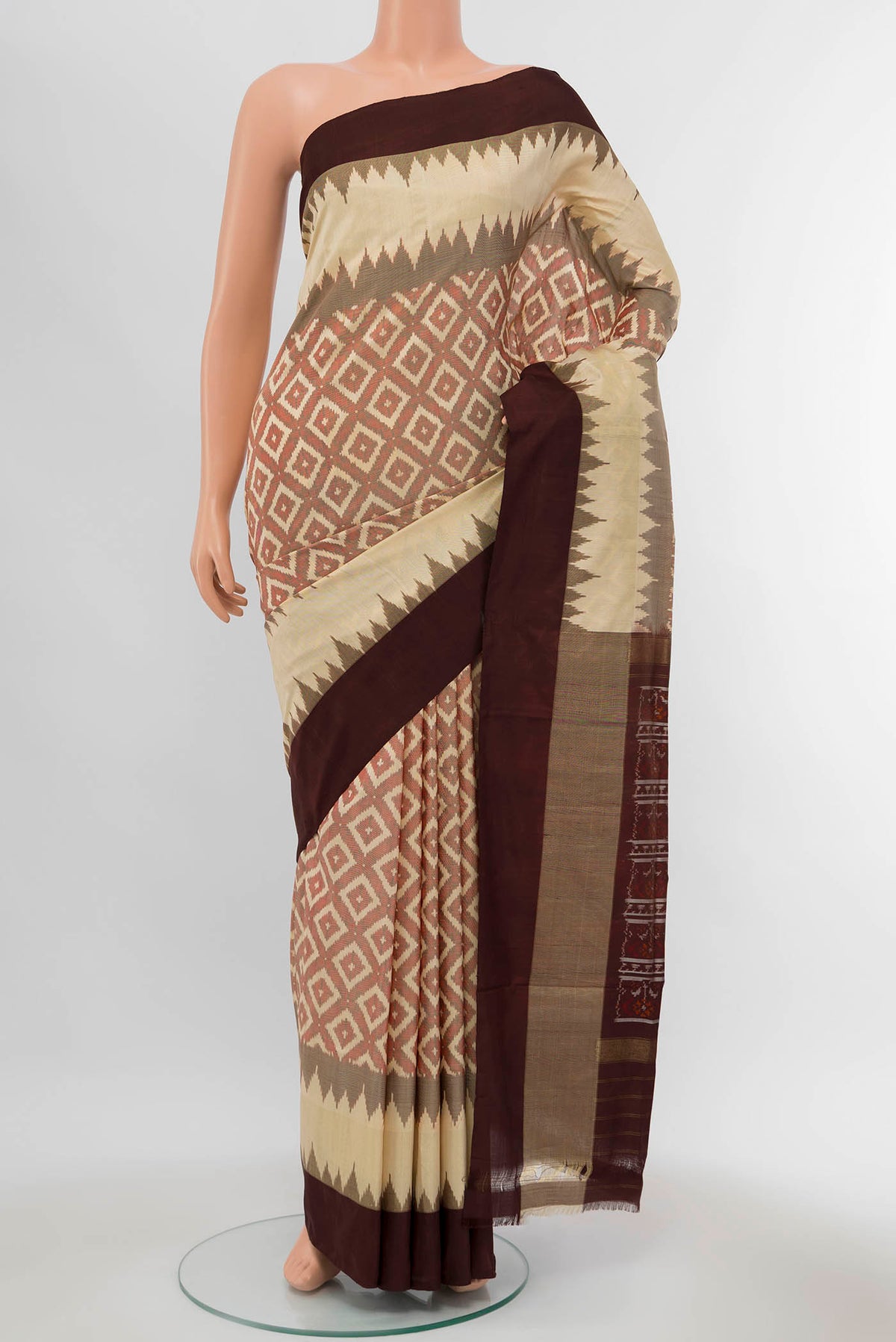 Cream Pochampally Silk Saree with Zari Butta on the body and Silk Border displayed on a mannequin