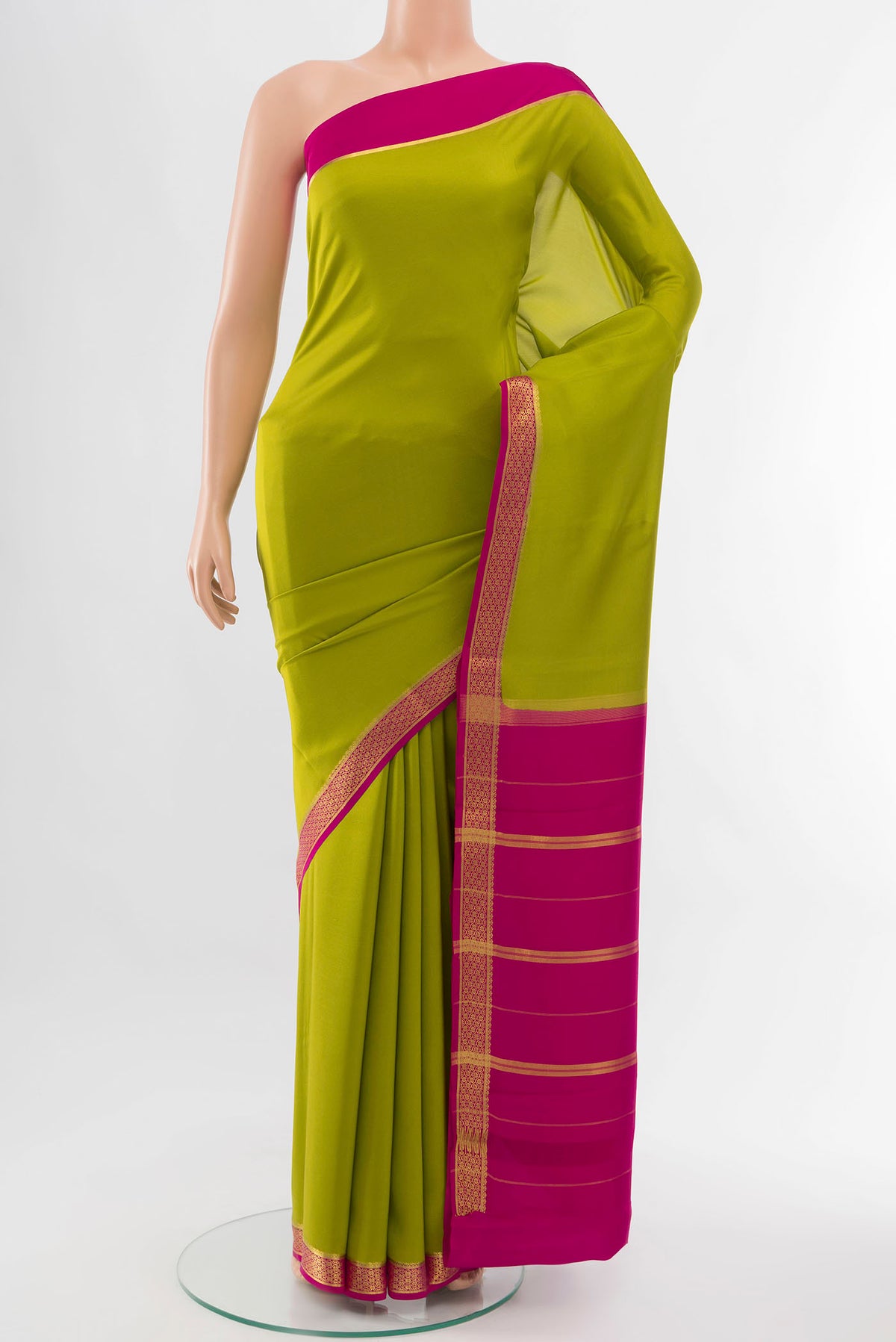 Parrot Green Mysore Crepe Saree with Zari Butta on the body and Silk Border displayed on a mannequin