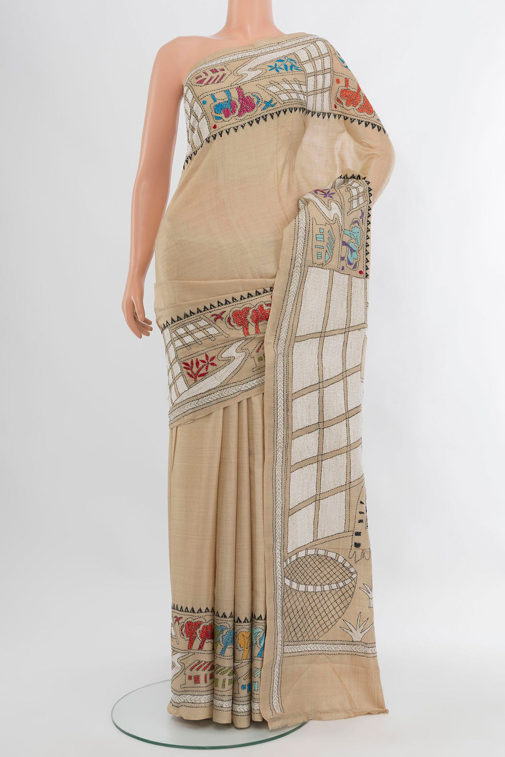 Beige Tussar Silk Saree with Plain Body and Embroidery Border.  displayed on a mannequin