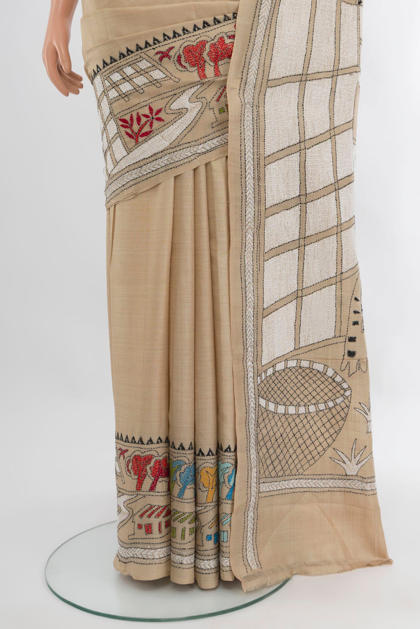 Pleats and pallu of Beige Tussar Silk Saree with Plain Body and Embroidery Border. 