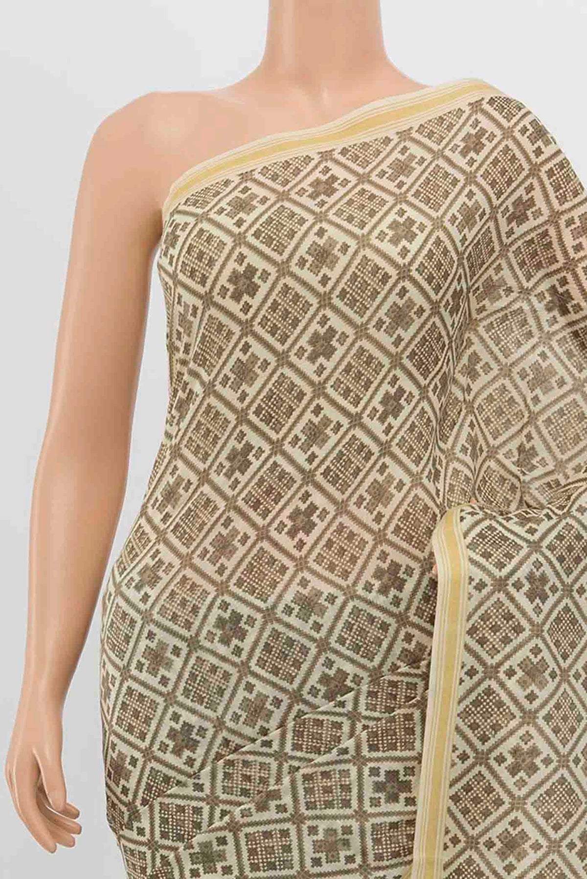 Border image of Beige Tussar Silk Saree with Zari Butta on the body and Silk Border