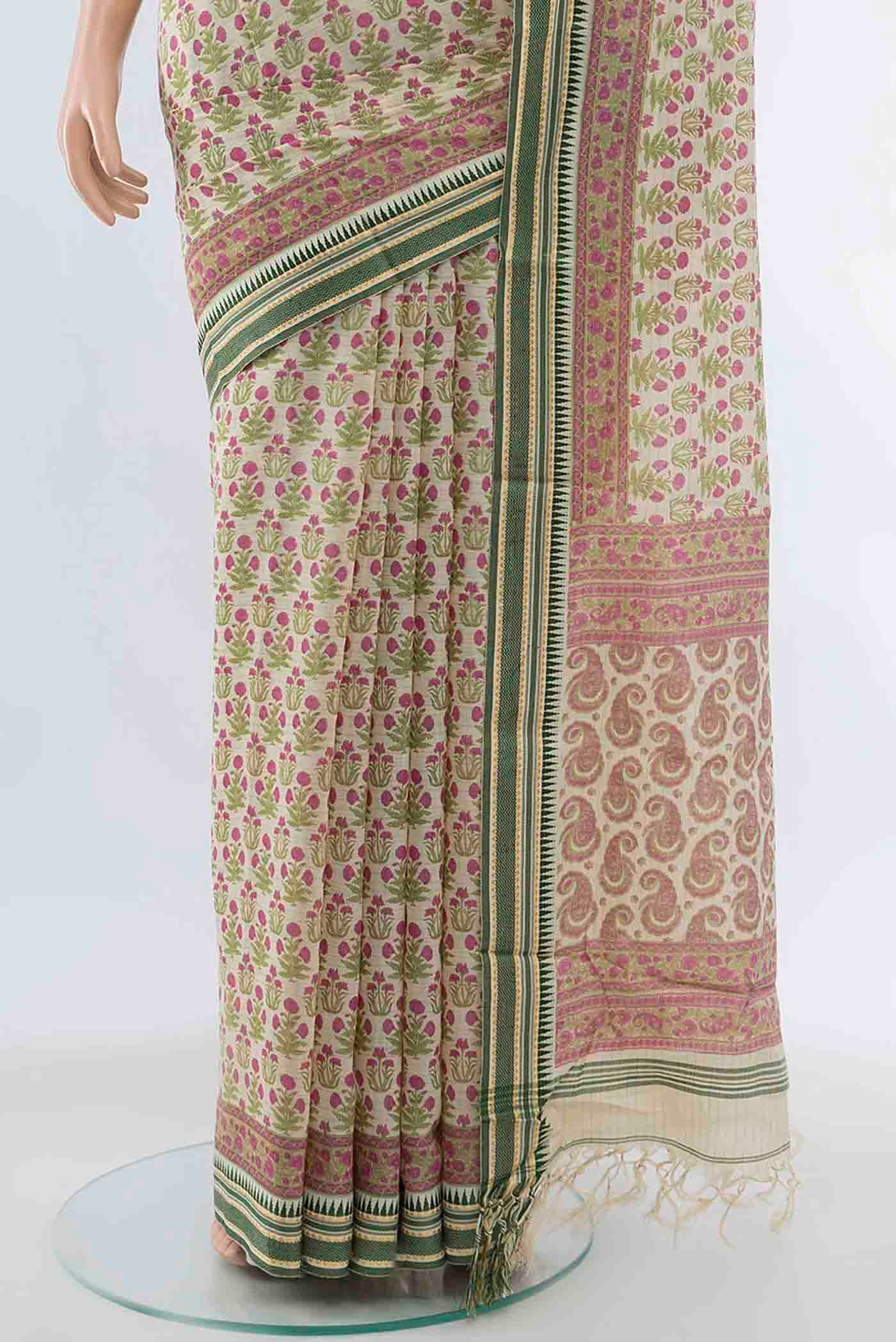 Pleats and pallu of Light Green Tussar Silk Saree with Floral Print on the body and Silk Border