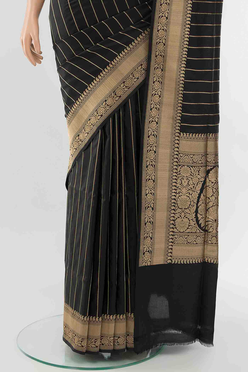 Pleats and pallu of Black Banarasi Silk Saree with Zari Butta on the body and Silk Border