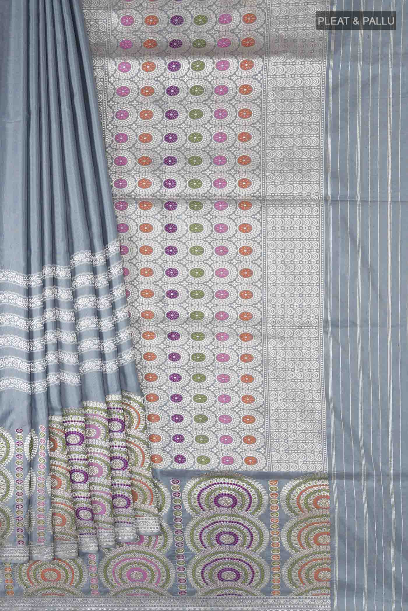 Pleats and pallu of Grey Banarasi Silk Saree with Plain Body and Zari Border