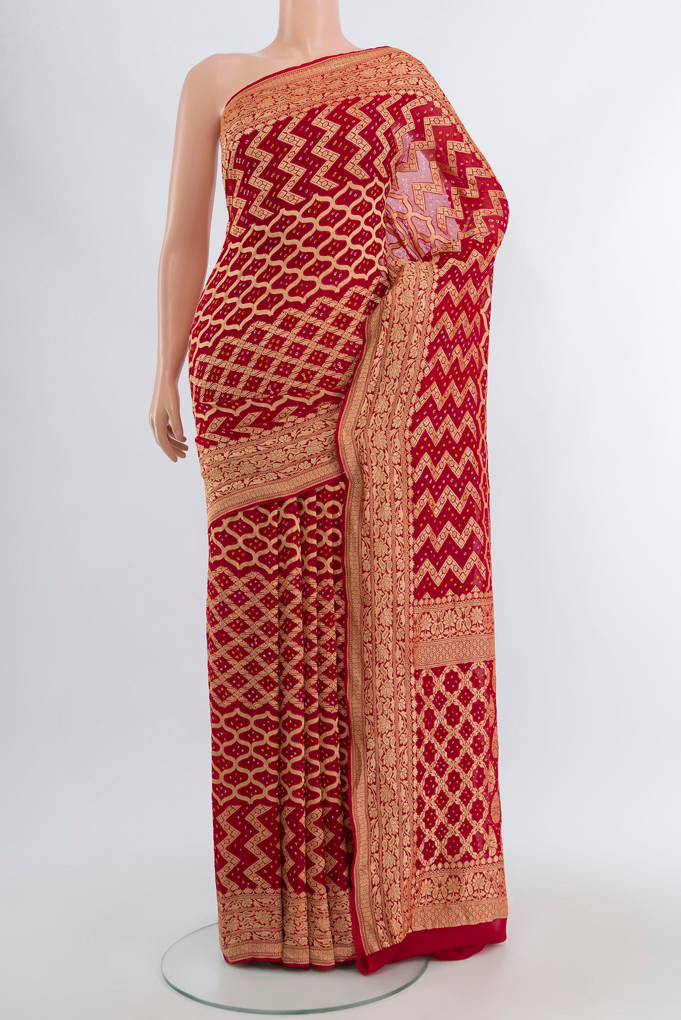 Red Banarasi Georgette Saree with Zari Butta on the body and Zari Border.  displayed on a mannequin