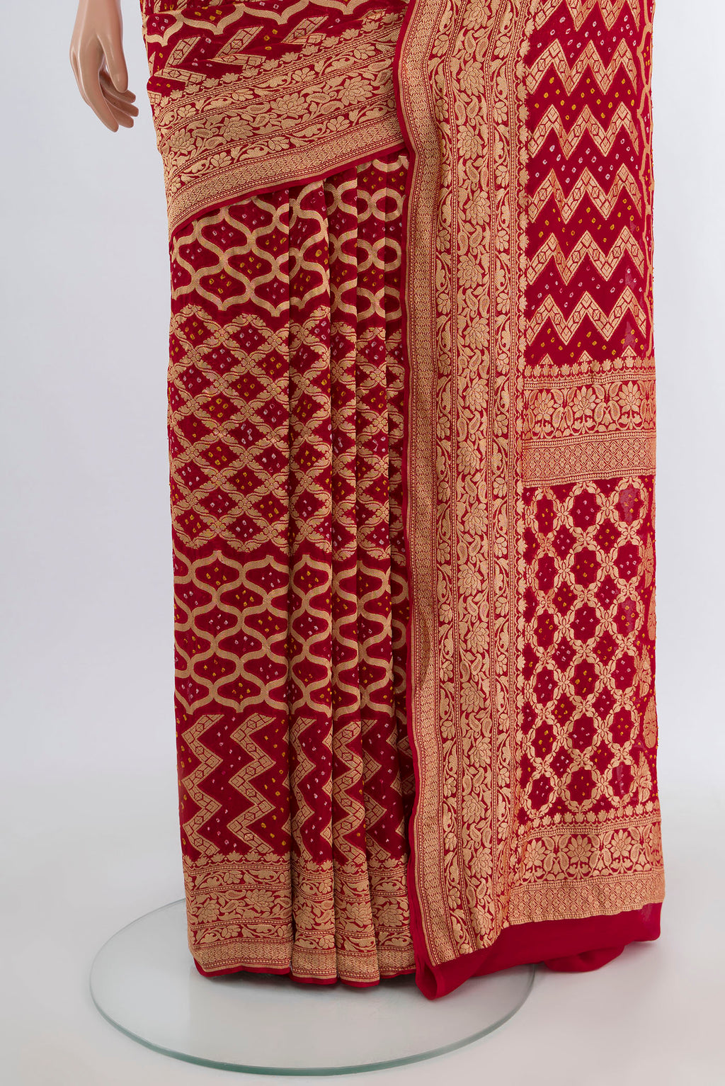 Pleats and pallu of Red Banarasi Georgette Saree with Zari Butta on the body and Zari Border. 