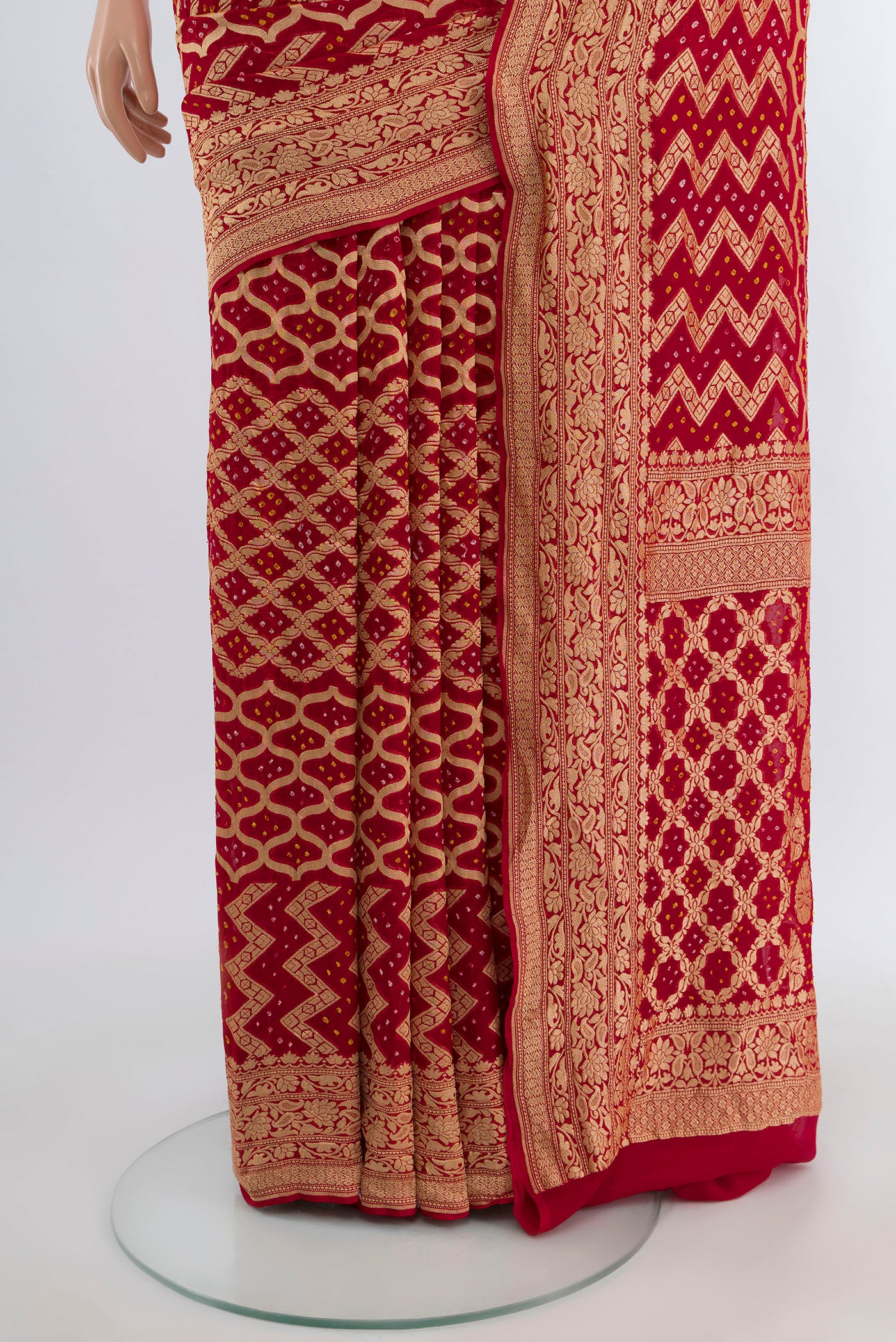 Pleats and pallu of Red Banarasi Georgette Saree with Zari Butta on the body and Zari Border. 