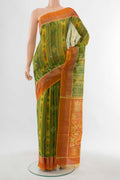 Parrot Green Pochampally Cotton Saree with Ikat Print on the body and Plain Border displayed on a mannequin