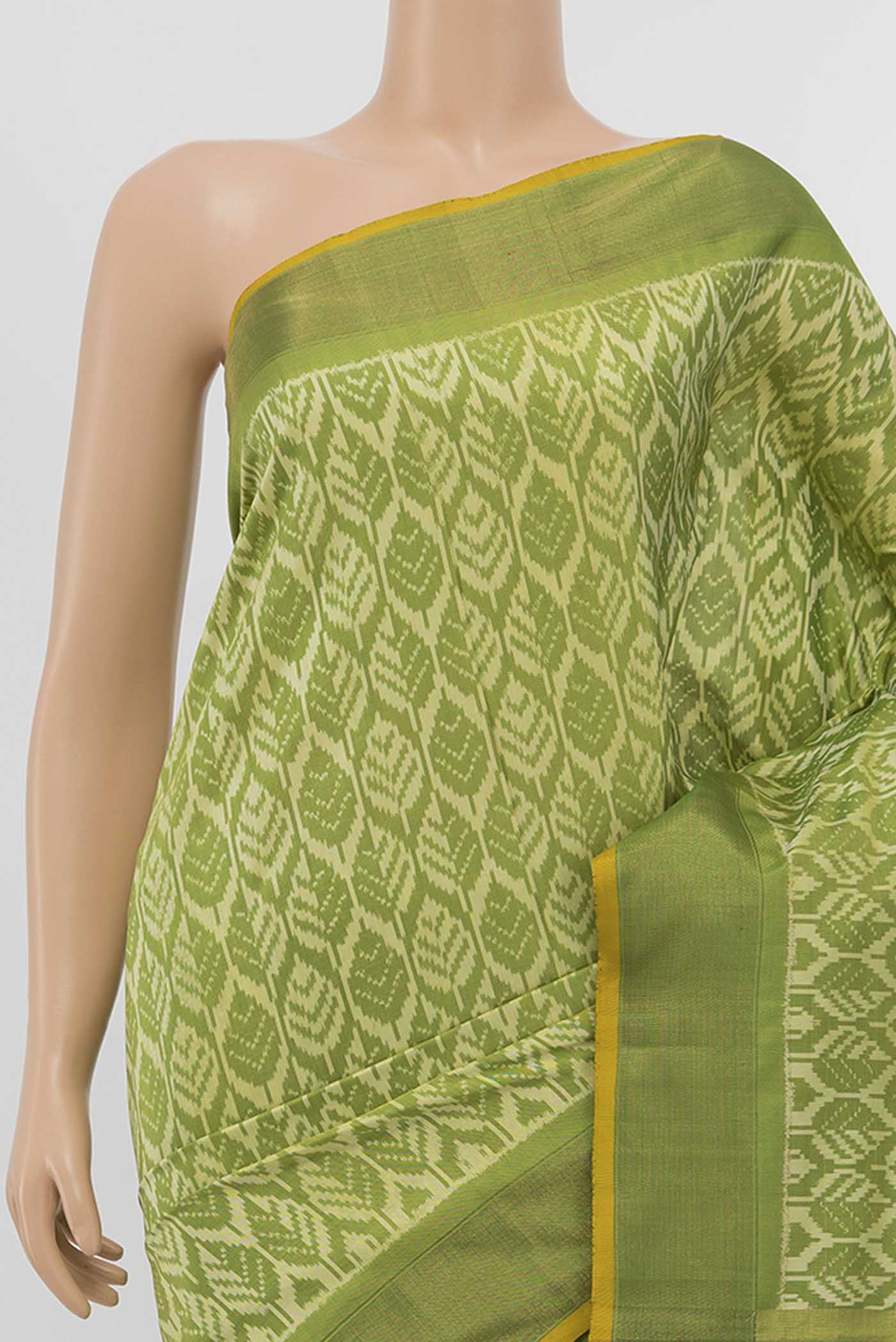 Border image of Green Pochampally Silk Saree with Ikat Print on the body and Zari Border