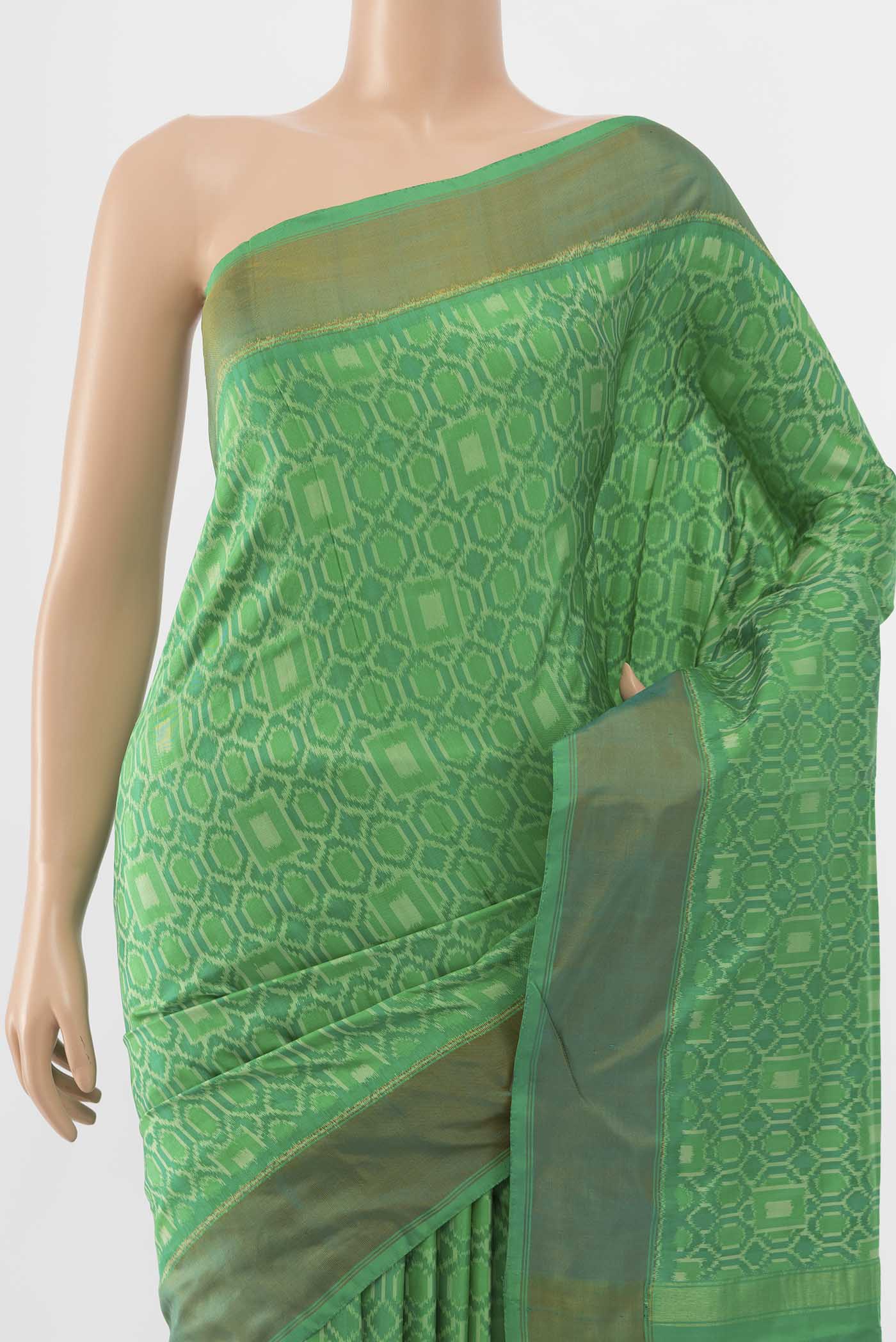 Border image of Green Pochampally Silk Saree with Ikat Print on the body and Zari Border