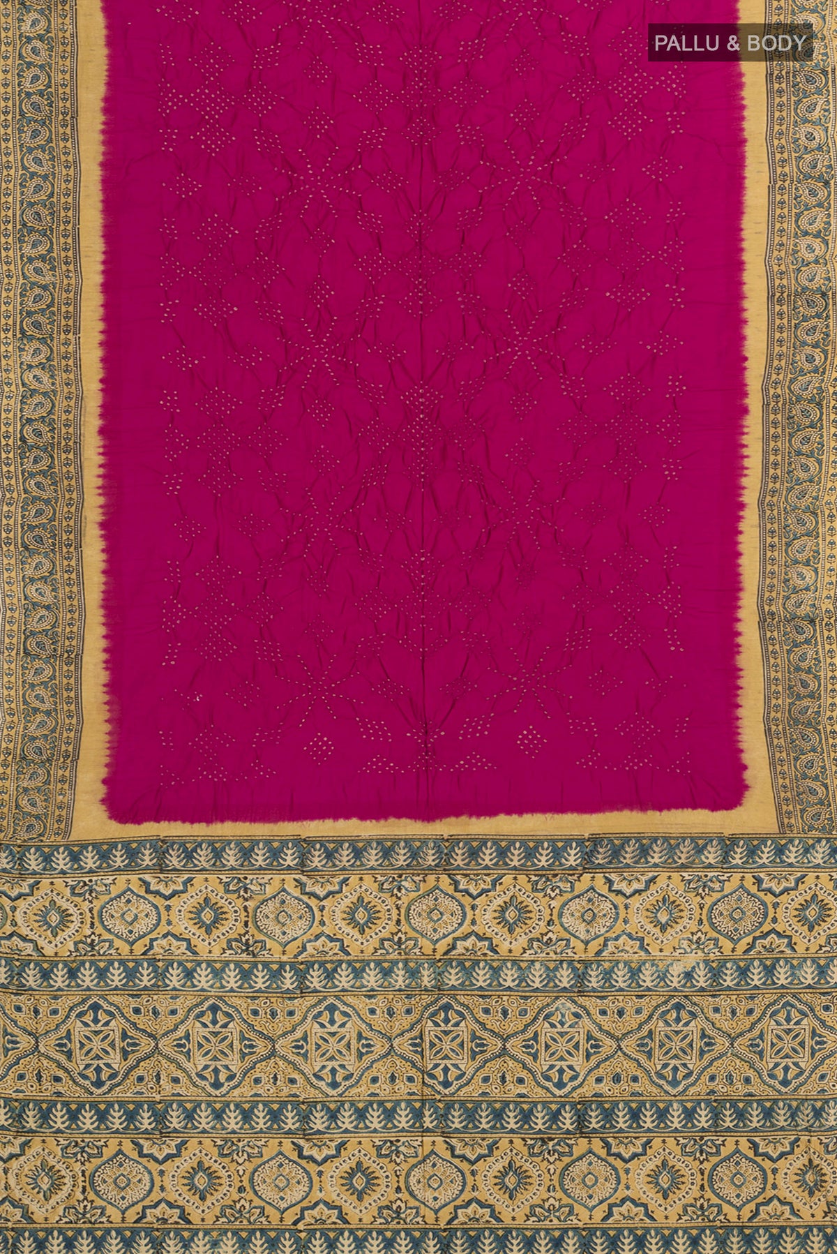Flat view of Magenta Bandhani Silk Saree with Bandhani on the body and Printed Border. 