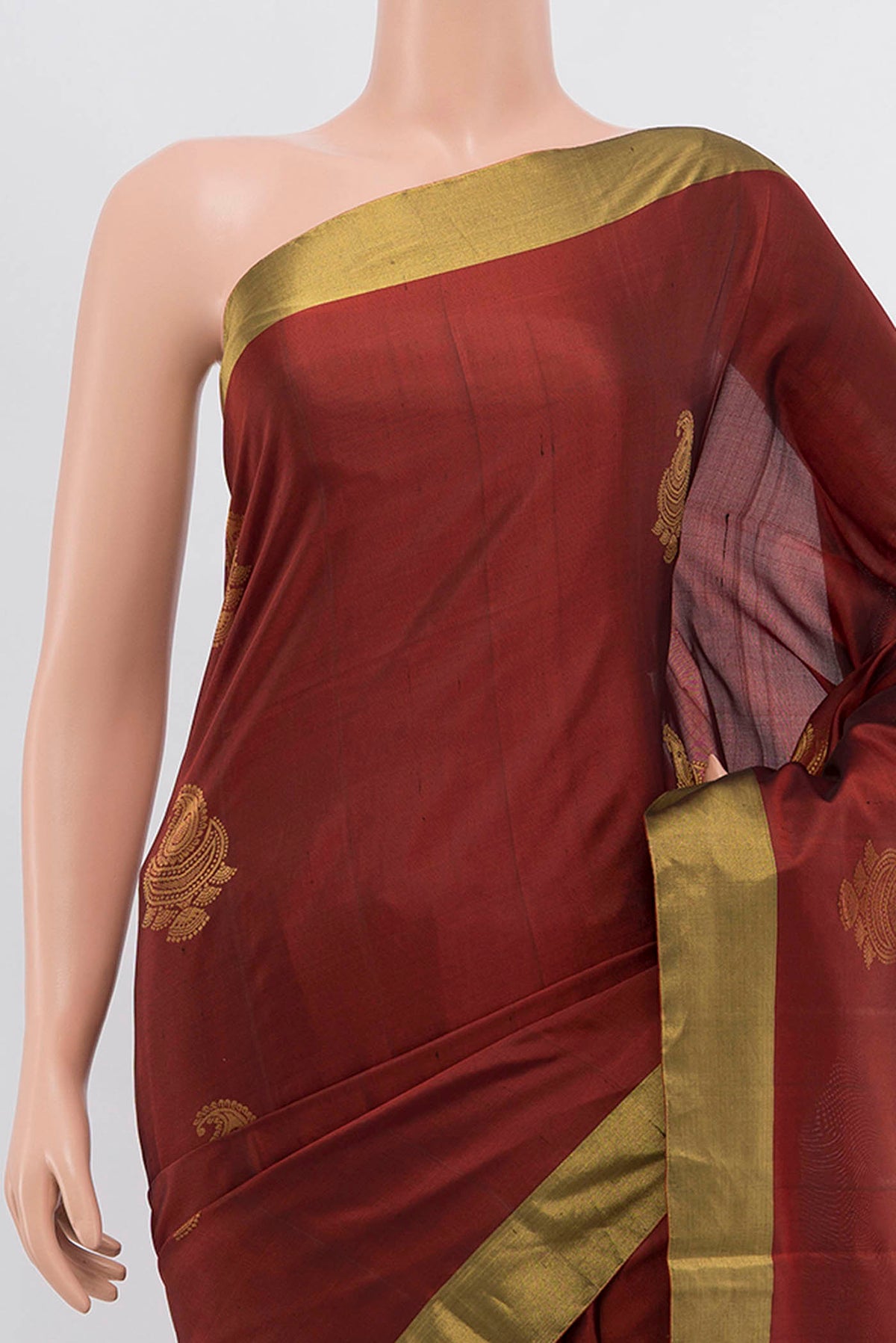 Border image of Brown Soft Silk Saree with Zari Butta on the body and Zari Border