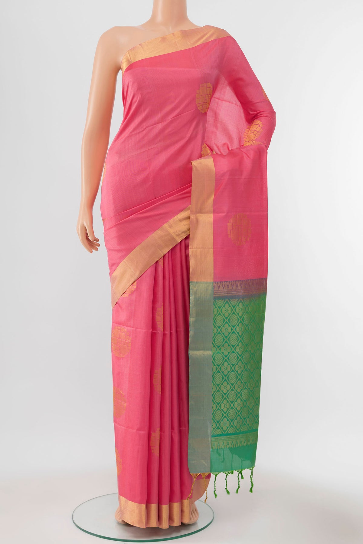 Rose pink Blended Soft Silk Saree with Zari Butta on the body and Zari Border displayed on a mannequin