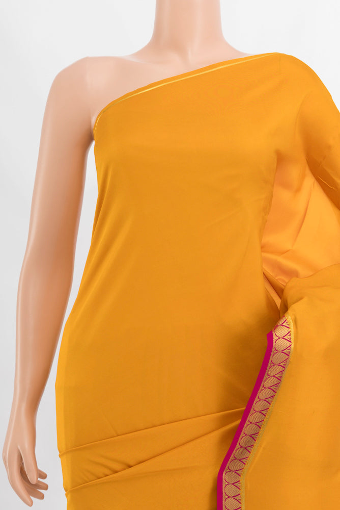 Border image of Yellow Mysore Crepe Saree with Plain Body and Silk Border. 
