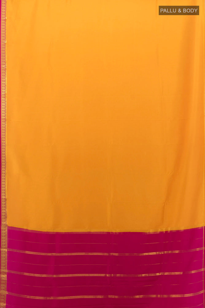 Flat view of Yellow Mysore Crepe Saree with Plain Body and Silk Border. 