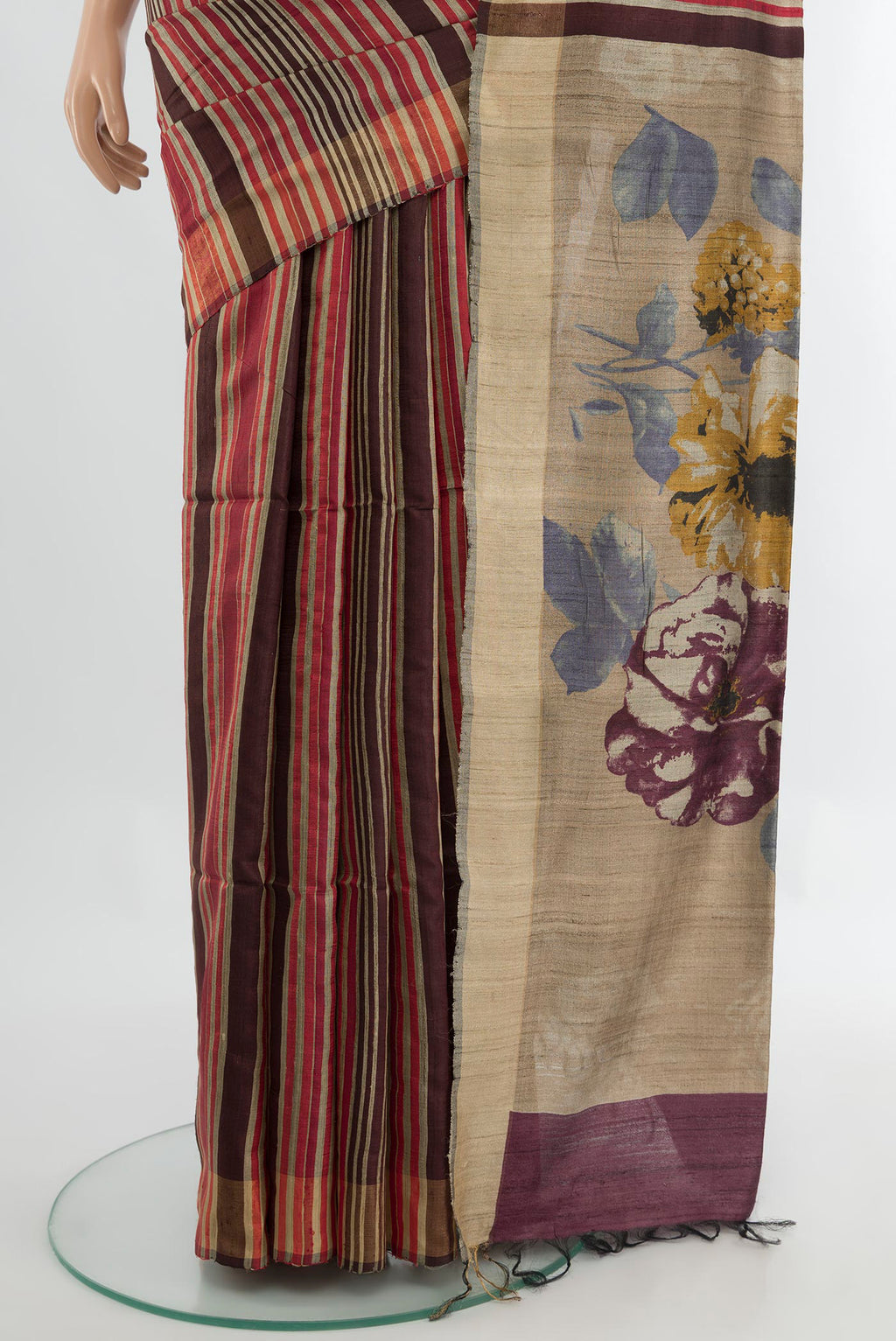 Pleats and pallu of Multi Color Tussar Silk Saree with Floral Print on the body and Silk Border. 