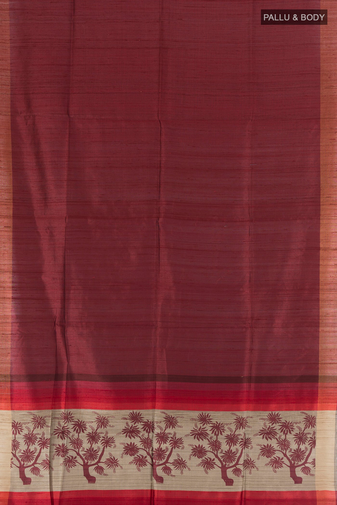 Flat view of Brown Tussar Silk Saree with Half And Half on the body and Zari Border. 