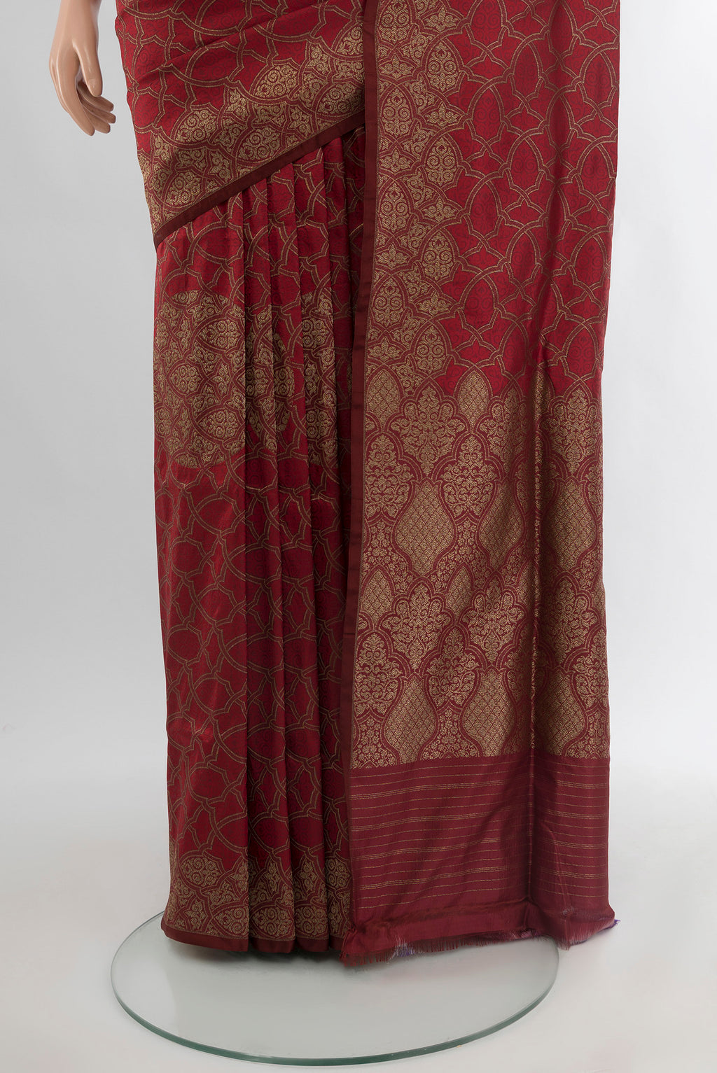 Pleats and pallu of Maroon Banarasi Silk Saree with Zari Butta on the body and Zari Border. 