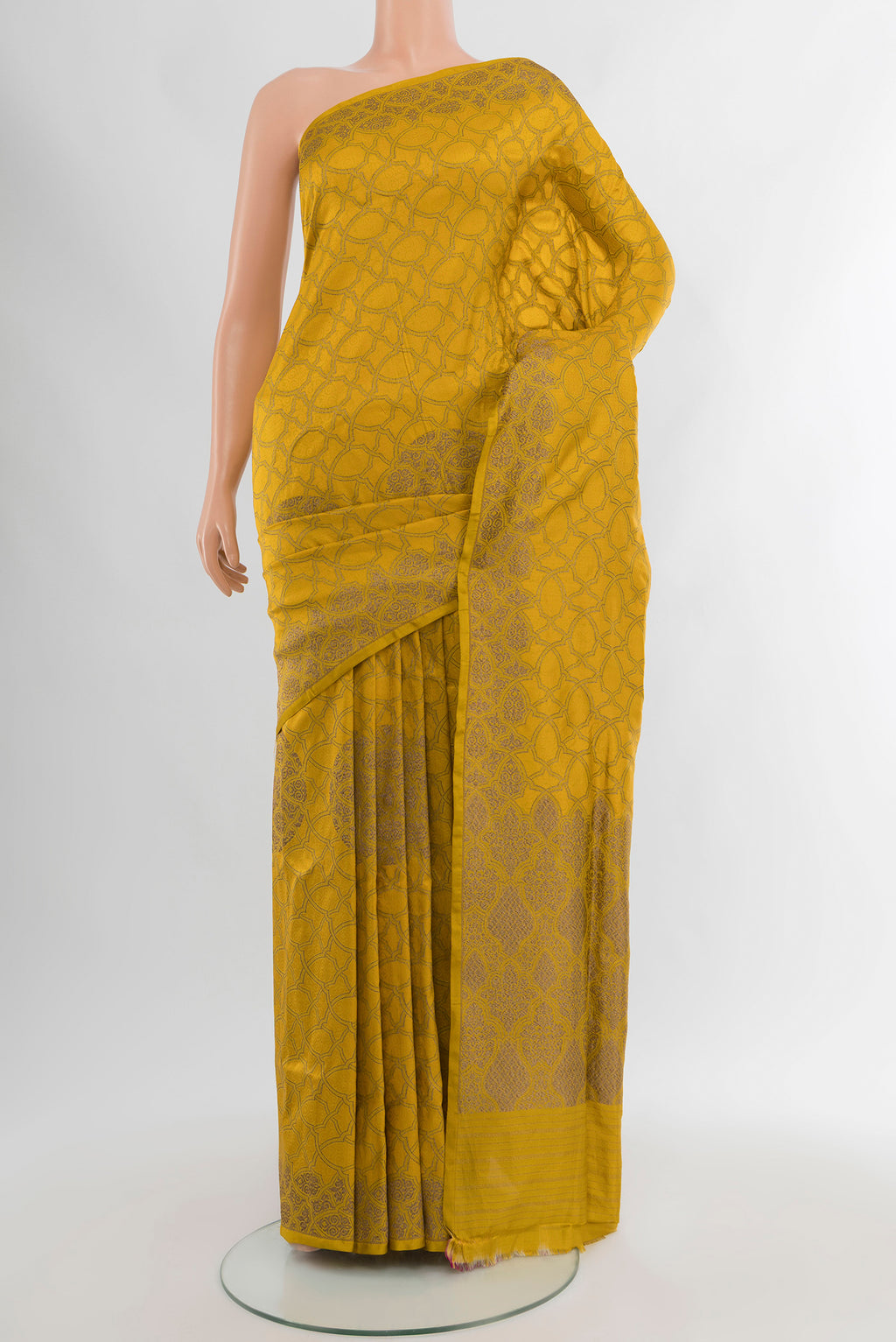 Yellow Banarasi Silk Saree with Zari Butta on the body and Zari Border.  displayed on a mannequin