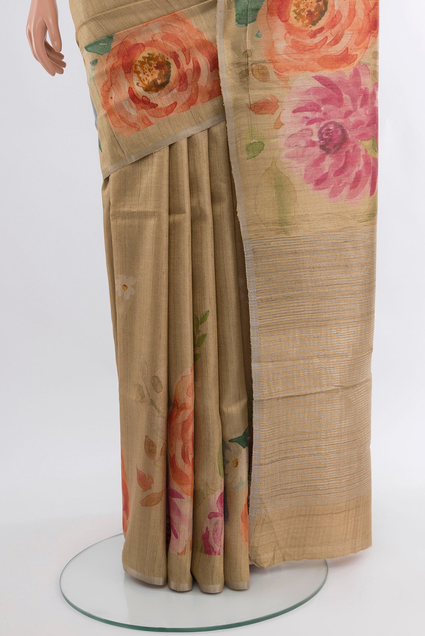 Pleats and pallu of Beige Tussar Silk Saree with Floral Print on the body and Without Border. 