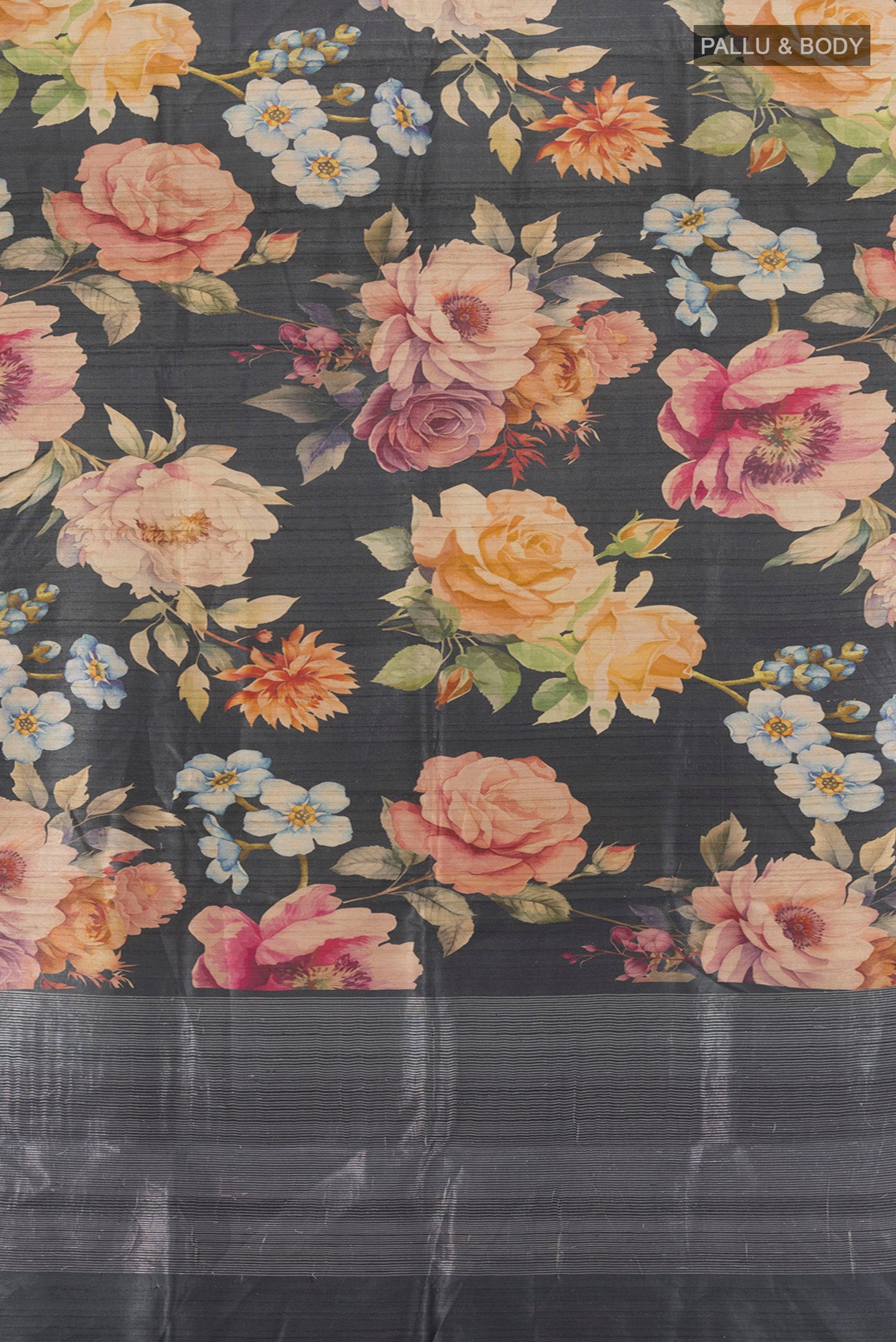 Flat view of Black Tussar Silk Saree with Floral Print on the body and Zari Border. 