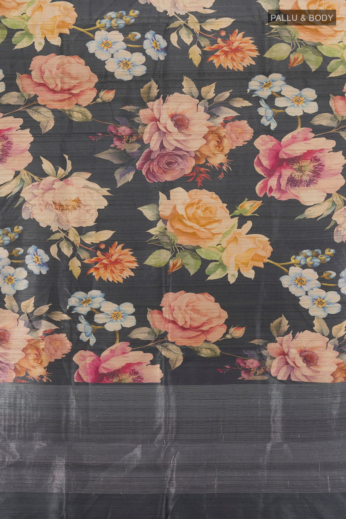 Flat view of Black Tussar Silk Saree with Floral Print on the body and Zari Border. 