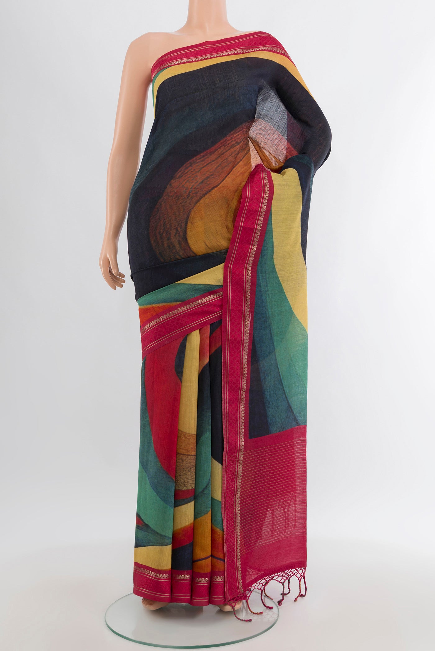 Multi Color Tussar Silk Saree with Fancy on the body and Zari Border.  displayed on a mannequin