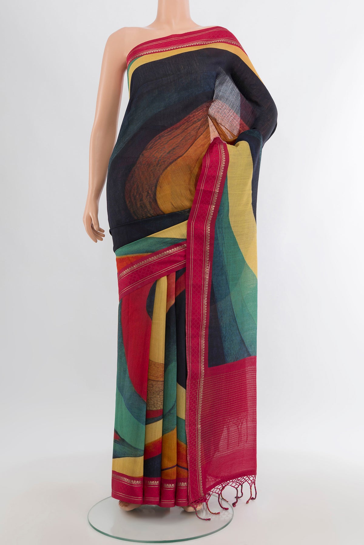Multi Color Tussar Silk Saree with Fancy on the body and Zari Border.  displayed on a mannequin