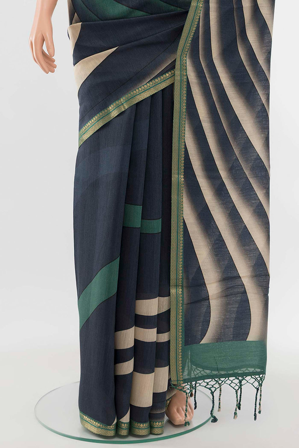 Pleats and pallu of Navy Blue Tussar Silk Saree with Floral Print on the body and Silk Border